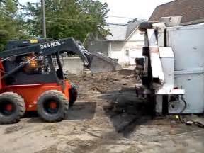 flipping a skid steer|flipping skid steers.